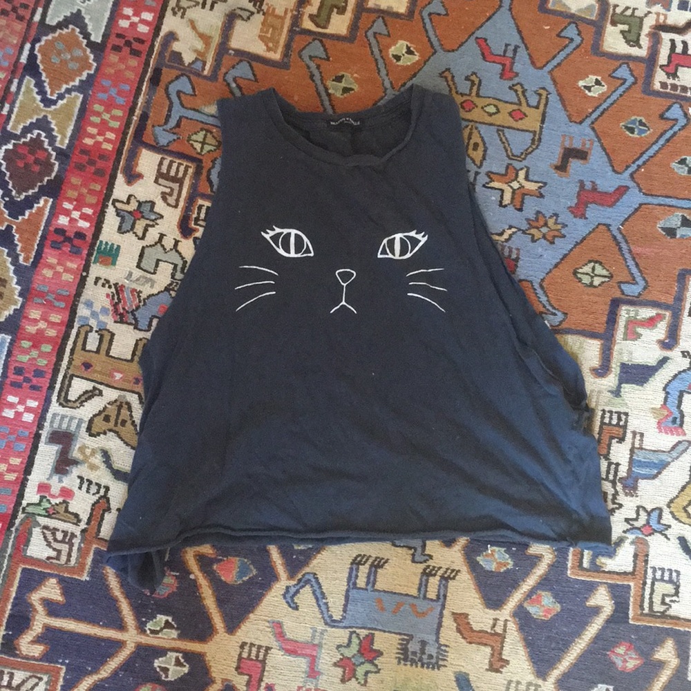 Muscle tee with cat face on it pretty cool right